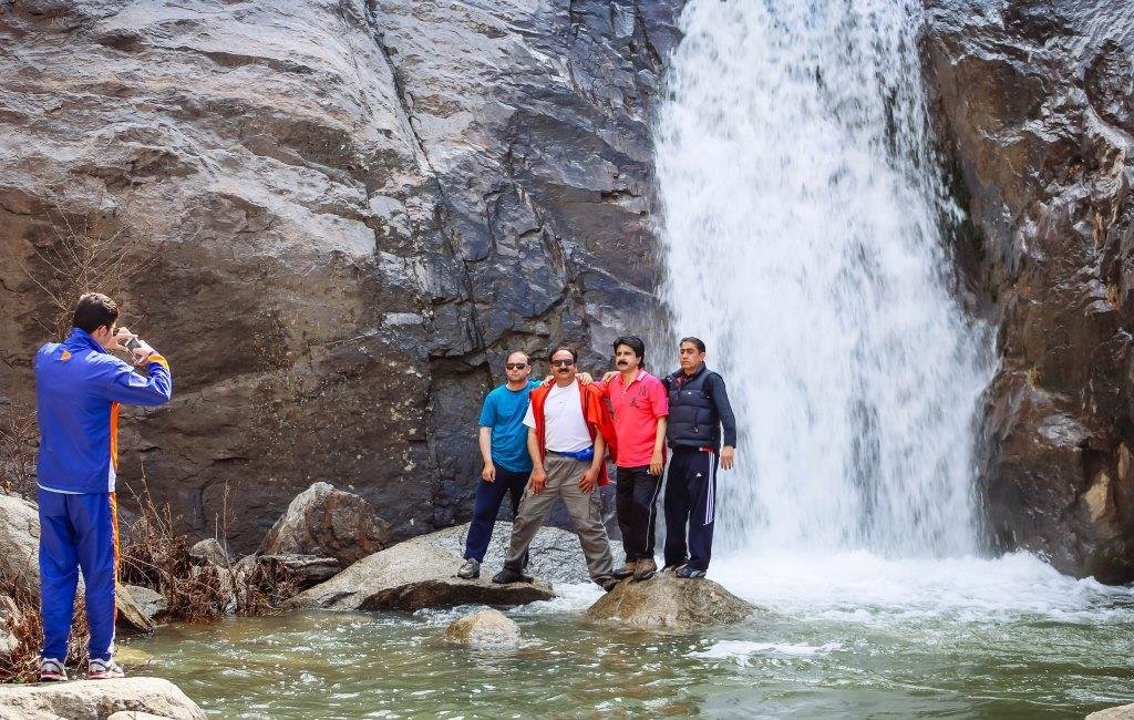 Tourists capture their moments in front of second waterfall at Jambil valley in Swat. Photo: Fazal Khaliq