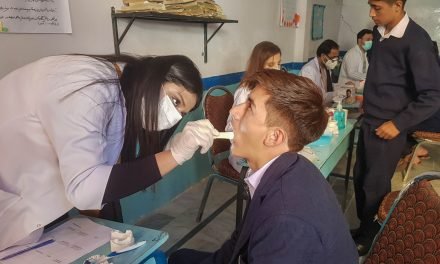 Young doctors and dentists provide volunteer services to orphans